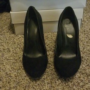 Black almond toe pumps